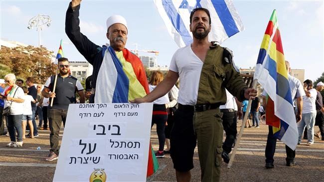 Un soudat israelian d'origina druza (e aràbia) protèsta còntra la lei sus l'estat-nacion israelian en 2018